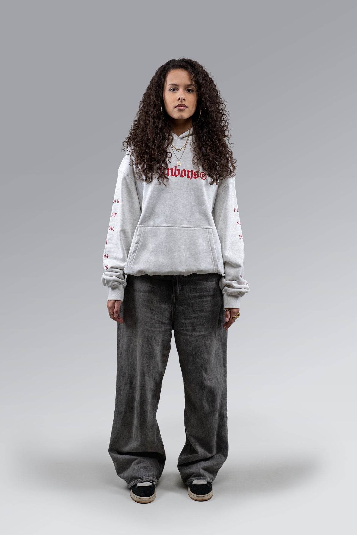 Female model wearing Grey Fear Not Hoodie, front view