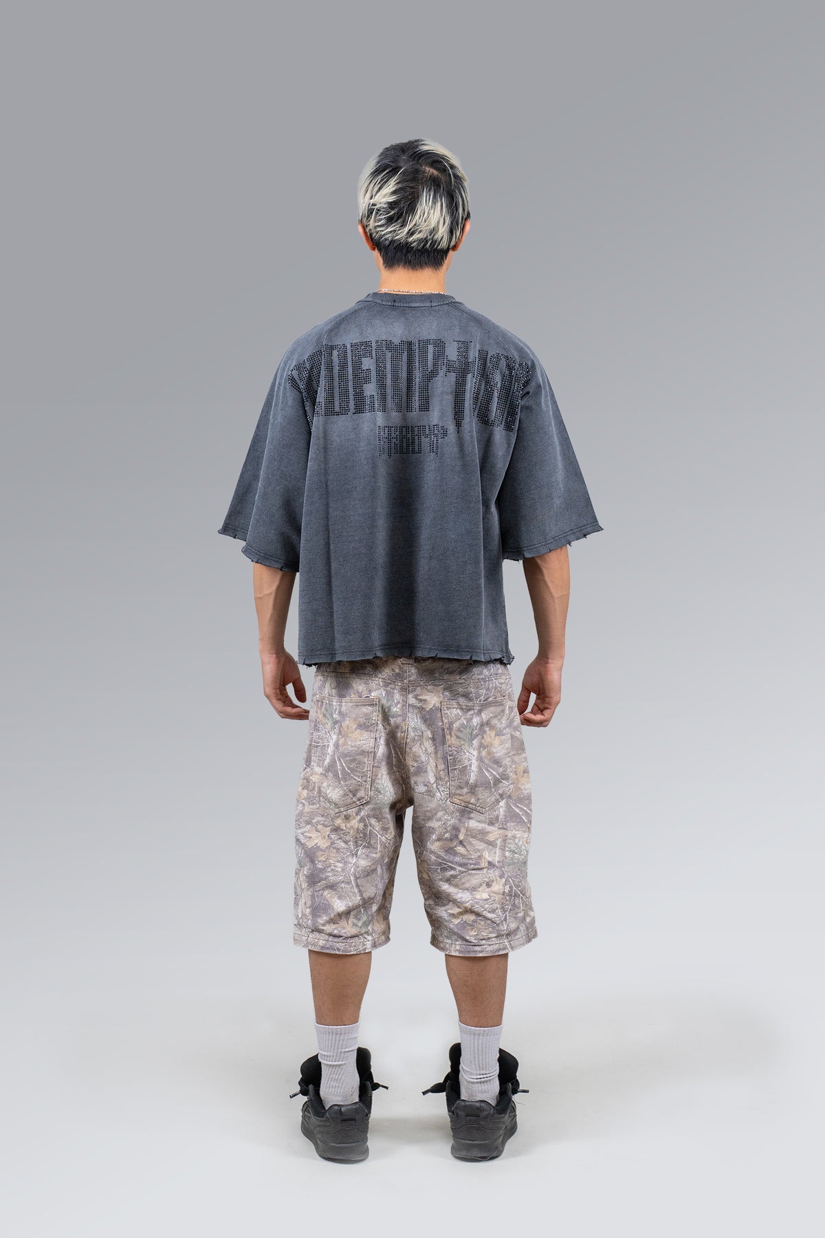 Male model wearing Black Rhinestone Tee, back view
