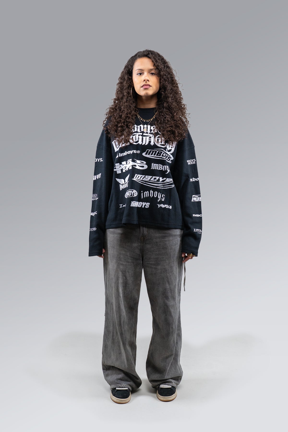 Female model wearing Legacy Logo Thermal, front view